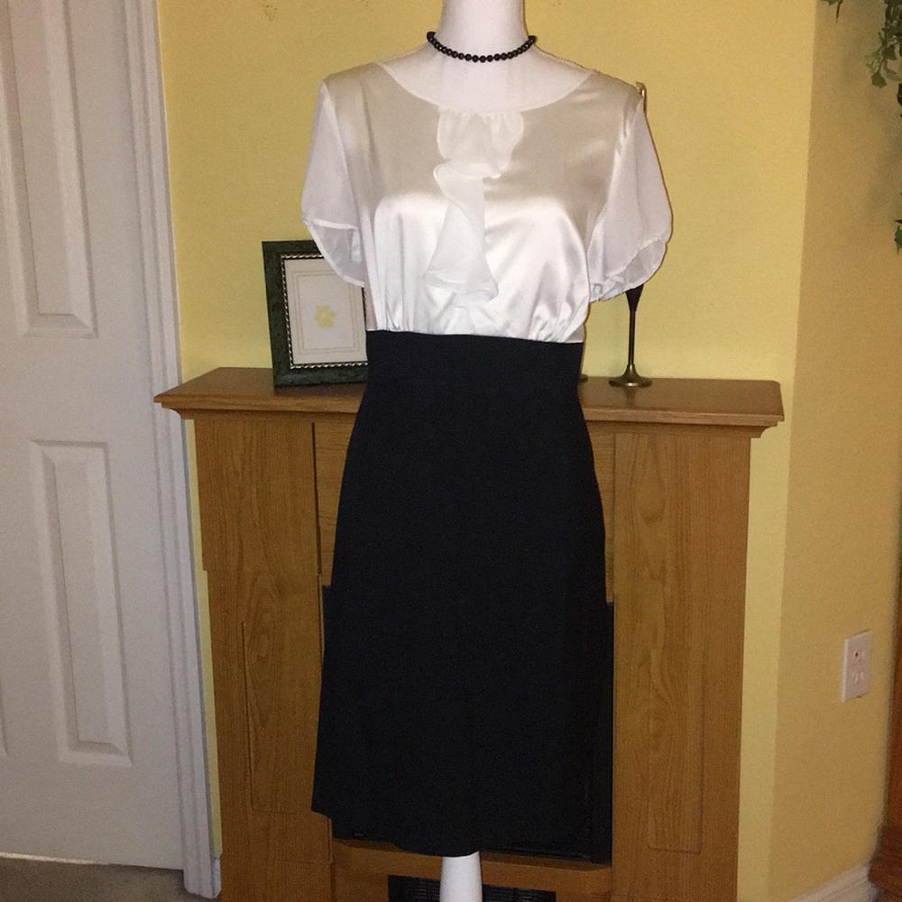 Lovely white silky blouse and gray skirted dress.